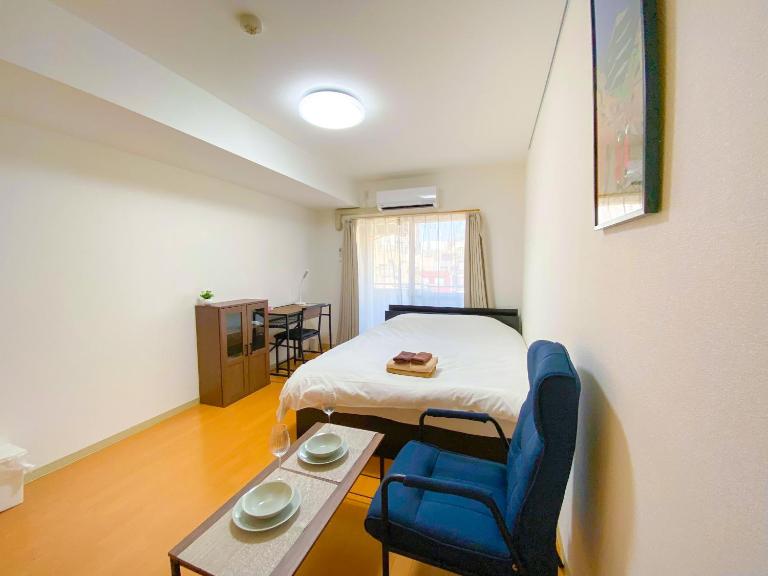 Walk to JR Shinjuku-Grand Écru II 603 - Balcony & Kitchen - B&B Tokyo