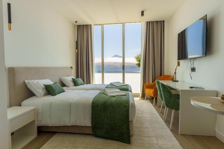 Suites Avenue Apartments - Chambres d'hôtes Horta