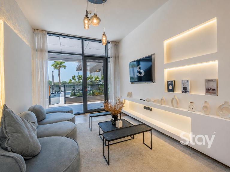 1BR Balcony overlooking Pool Studio City - B&B Dubai
