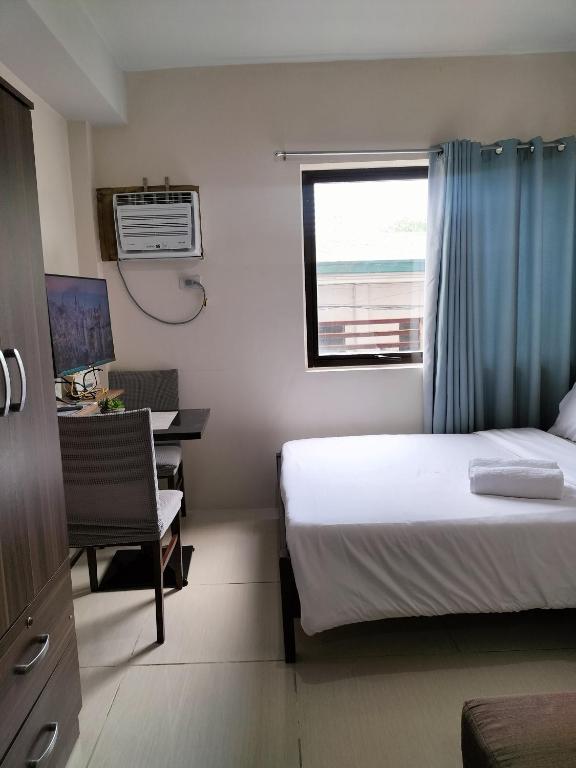 Cozy35 The Persimmon Studio, Near Airport, SM, Ayala, Cebu Business Park, Cebu IT Park - Chambres d'hôtes Cebu