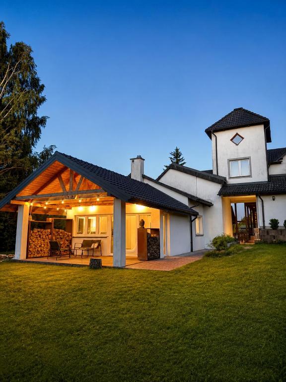 Dom Szalkowo Jeziorak Pavillon - Chambres d'hôtes Szałkowo