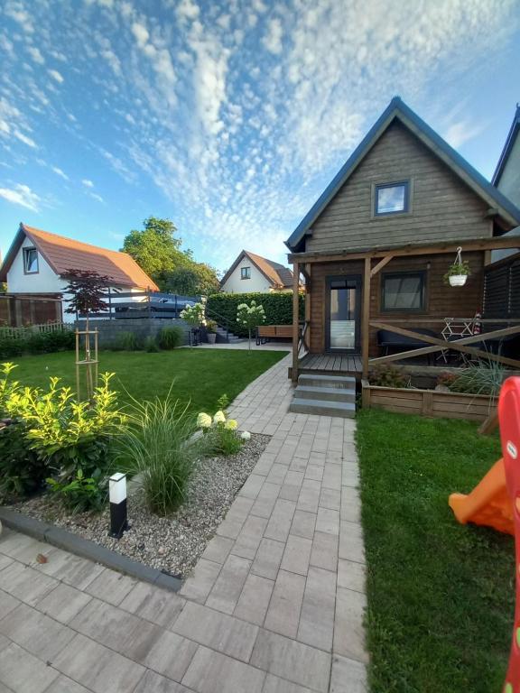 Amelia Domek letniskowy - B&B Mechelinki
