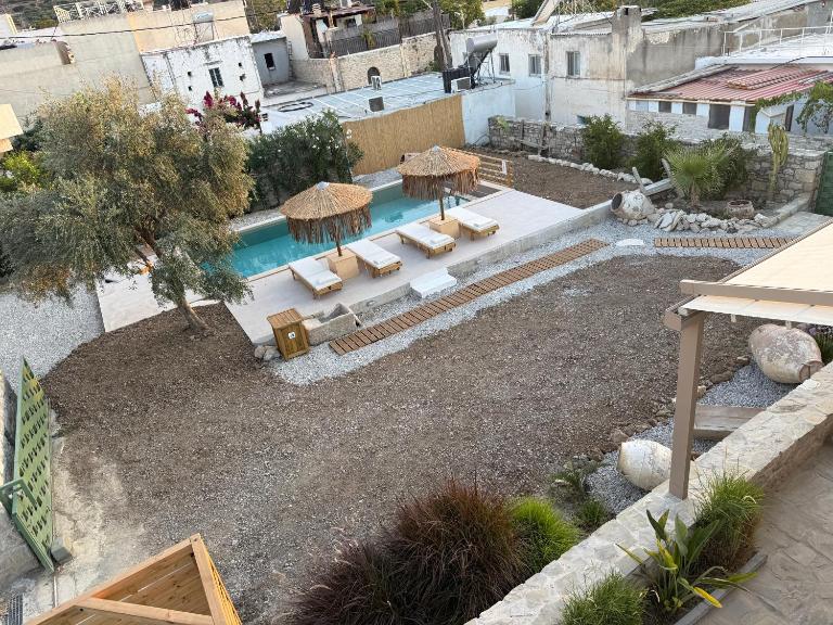 Papadia Luxury Apartments - Chambres d'hôtes Pitsídia