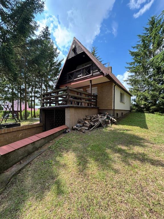 Domek nad jeziorem z własną kładką- raj dla wędkarzy i grzybiarzy - Ferienwohnung Orzechowo
