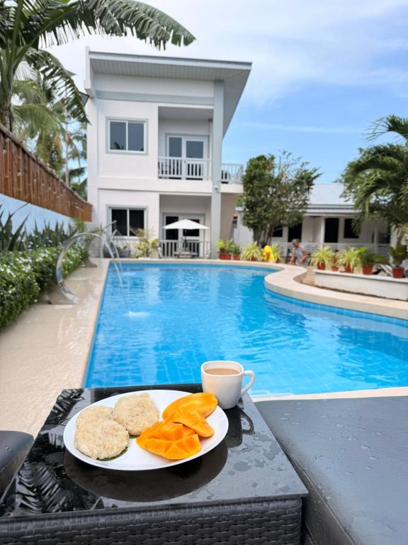 Olliz Huvila - B&B Siquijor