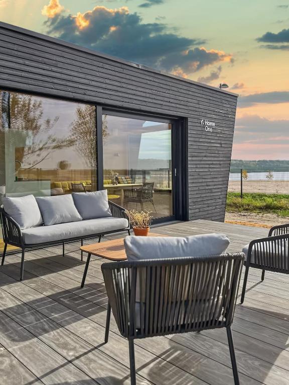 FUTOPIA Strandhäuser mit Seeblick, Sauna & Hot Tub - Ferienwohnung Buschmühle