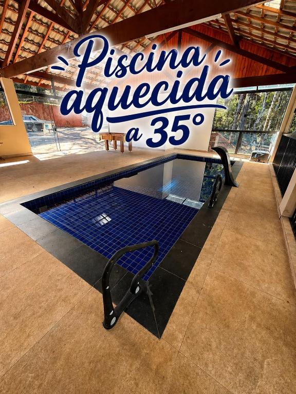 Casa Campos do Jordão - Com PISCINA AQUECIDA - Chambres d'hôtes Campos do Jordão