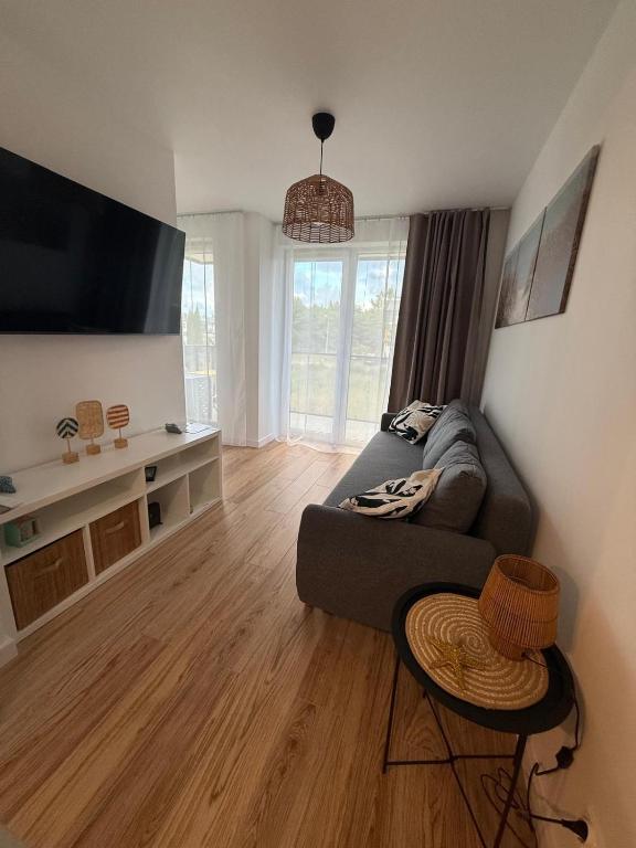 Ostoja Ostrowo - apartament nad morzem z garażem, klimatyzacją i 2 balkonami - Chambres d'hôtes Ostrowo
