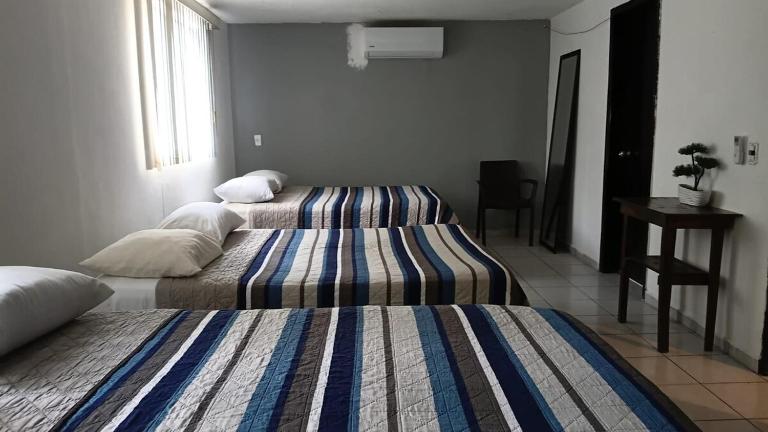 3 camas matrimnoniales, baño, Clima,Wifi, G Estacionamiento,Independiente - B&B Ciudad Valles
