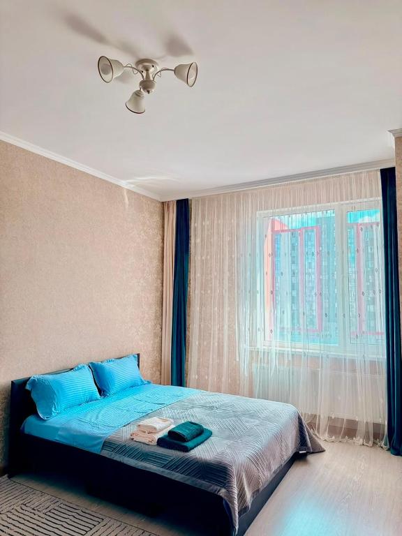 Уютные апартаменты рядом с EХРО в ЖК ЕХРО Plaza - Ferienwohnung Astana