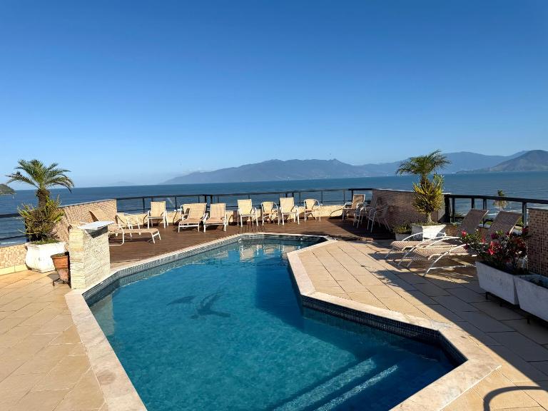 Apartamento no Centro 150 metros da praia com piscina e estacionamento incluso - Ferienwohnung Caraguatatuba