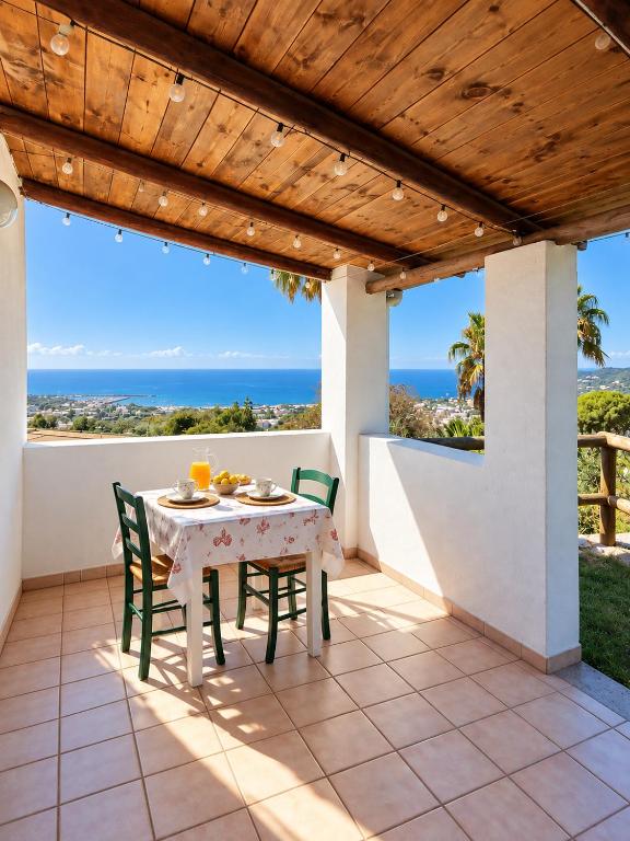 Monolocale con terrazza, solarium e vista mare al tramonto, Forio d'Ischia -L'Ulivo - B&B Forio