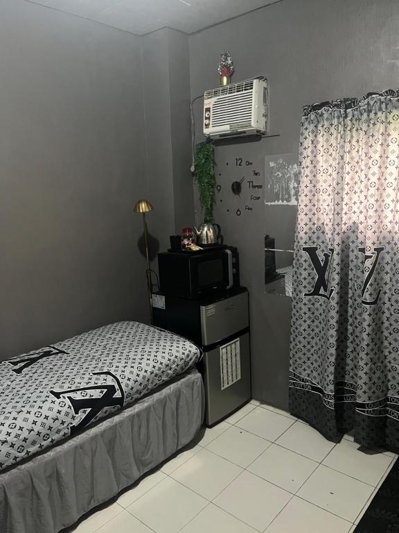 JOHNFONZ BUILDING Affordable Room - Bed and Breakfast Manilla