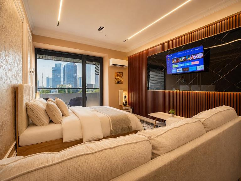 Studio in NRG U - TOWER with a view of the city - Chambres d'hôtes Tachkent