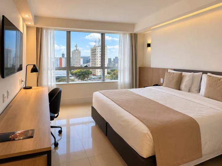 Flat Particular no Tryp - Piscina Aquecida - Estacionamento - Frente ao Shopping - TV - WIFI - Ar Cond - Serviço de Quarto - Chambres d'hôtes Brasilia
