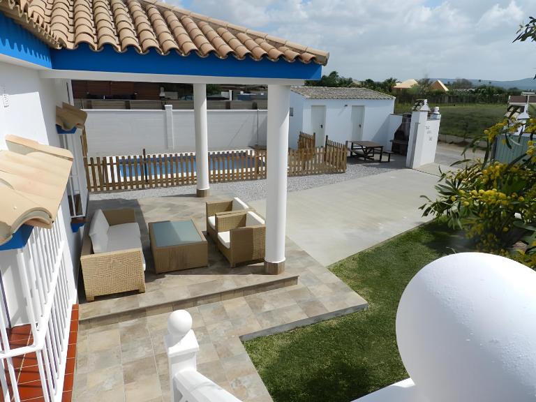Chalet en la playa con piscina Privada en el Palmar terraza y chimenea - B&B El Palmar