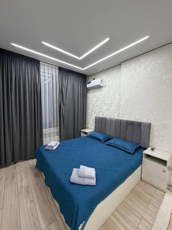 Уютная однушка в центре города рядом Дендропарк - B&B Shymkent