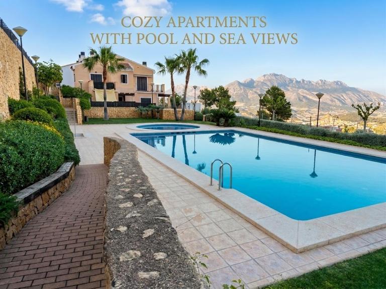Cozy apartments with pool and sea views - B&B Polop
