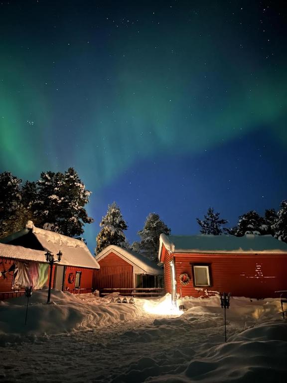 Camp Caroli Wooden Cabins - B&B Jukkasjärvi
