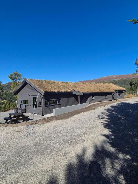 Modern mountain cabin with panorama view- Beds made up and ready and final washing included - Chambres d'hôtes Eggedal