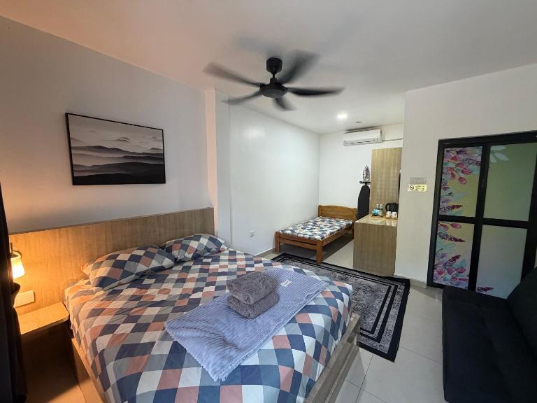 Kak Pah Roomstay Paka - Chambres d'hôtes Paka