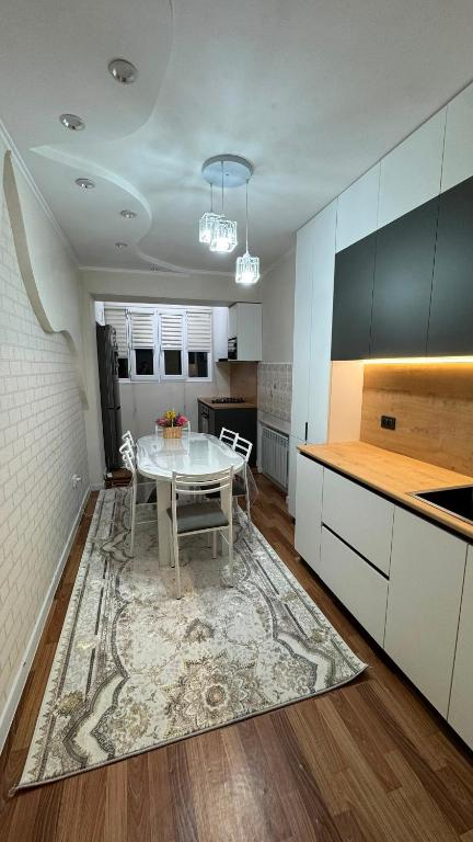 уютная квартира в отличном районе - B&B Karakol