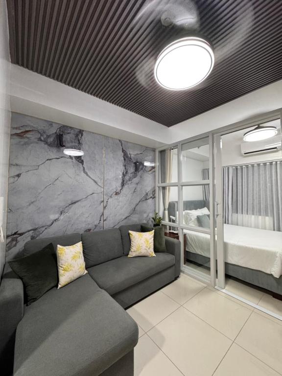 Kaizen cozy condo at Red Residences Makati - Chambres d'hôtes Manille
