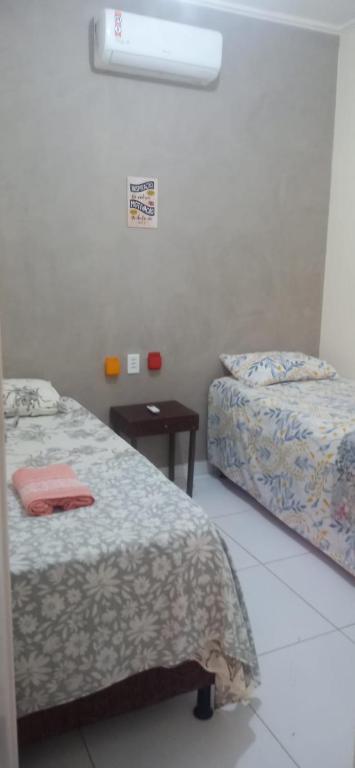Casa com ótima localização, composta por 2 quartos, com ar-condicionado nos dois quartos, além de garagem para carro hatch de pequeno porte - Ferienwohnung Petrolina