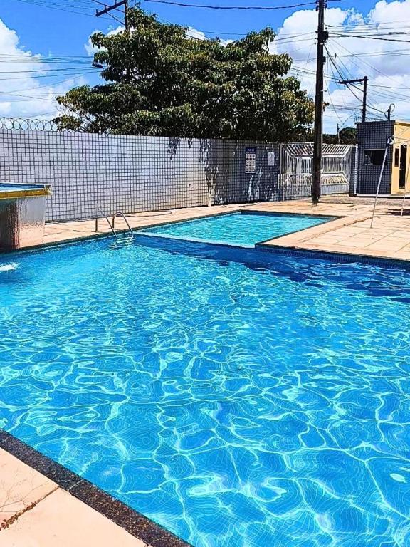 Casa Confortável em Condomínio com Piscina - B&B Prado