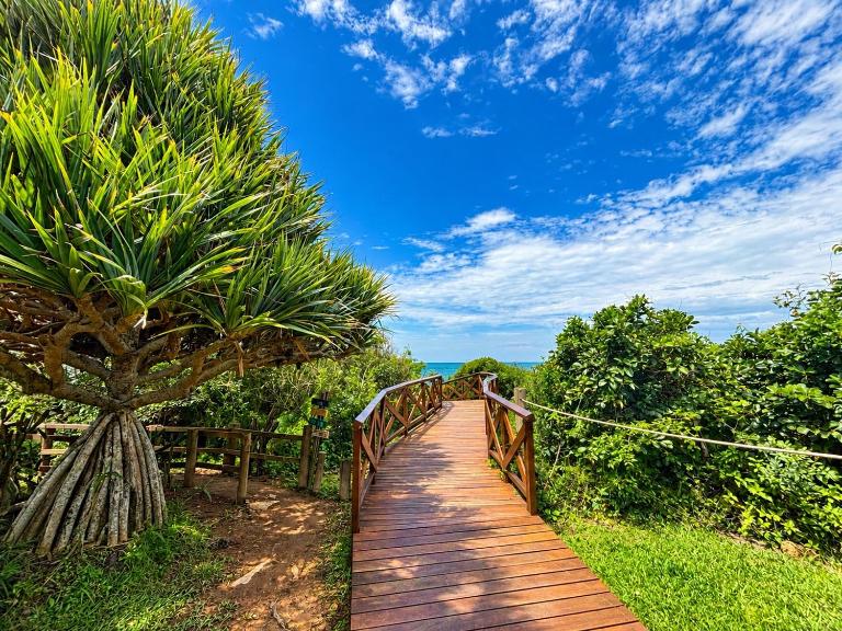Casa acolhedora em condominio com acesso exclusivo a praia - B&B Camboriú