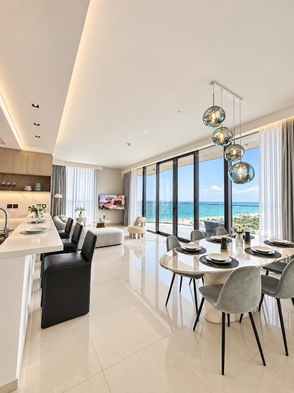 Bay residence - Luxury Beachfront 2BR apartment with sea view - Ferienwohnung Ra’s al-Chaima