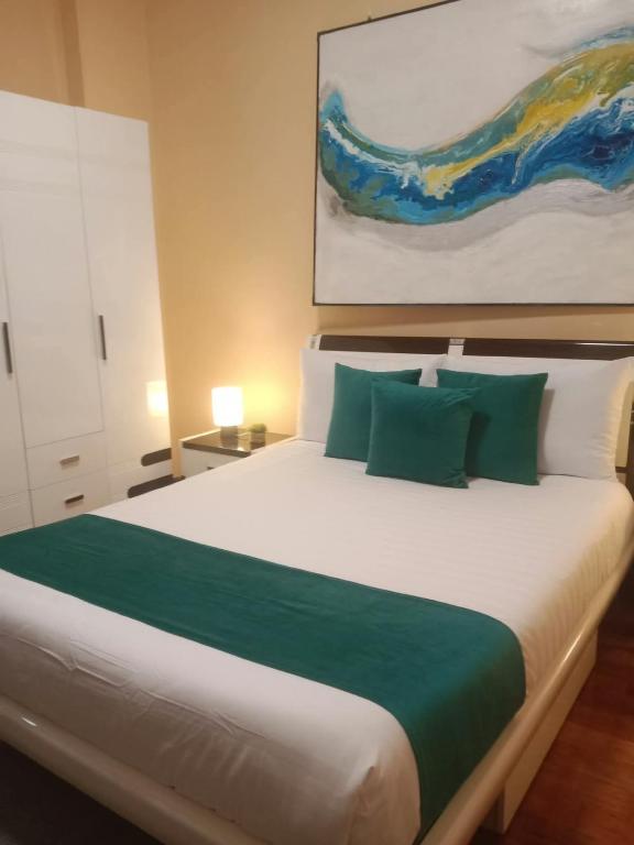 Elegant Boutique One-Bedroom Escape in Legazpi Village The Mosaic Tower - Chambres d'hôtes Manille