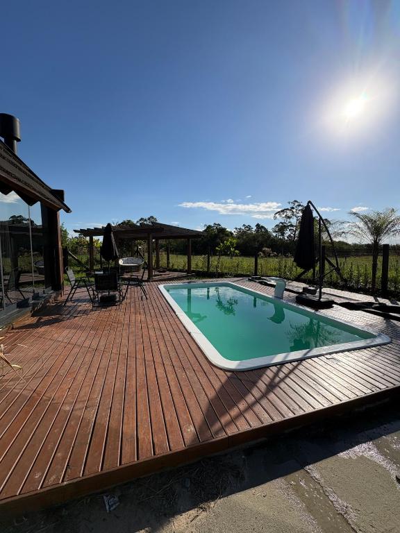 Amora Chalé com Piscina Aquecida e Hidro - Chambres d'hôtes Araranguá