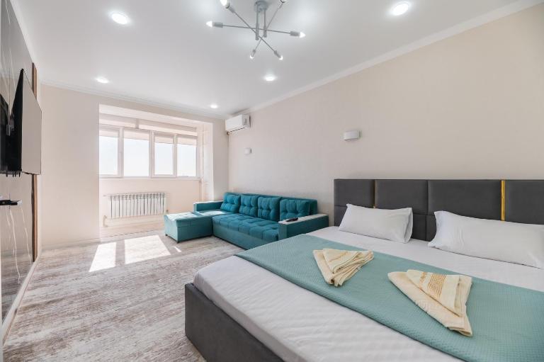 Сан Сити ЖК - Chambres d'hôtes Konayev
