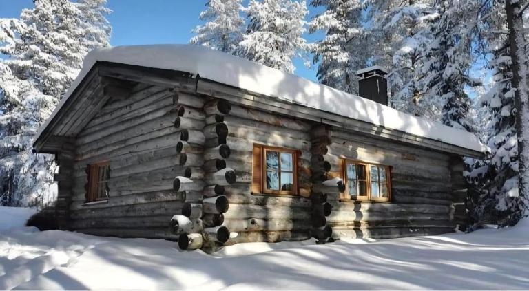 Kelorinne ladun ja järven läheisyydessä - B&B Ruka