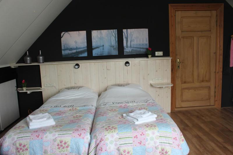 Family Room with Shared Bathroom image 2