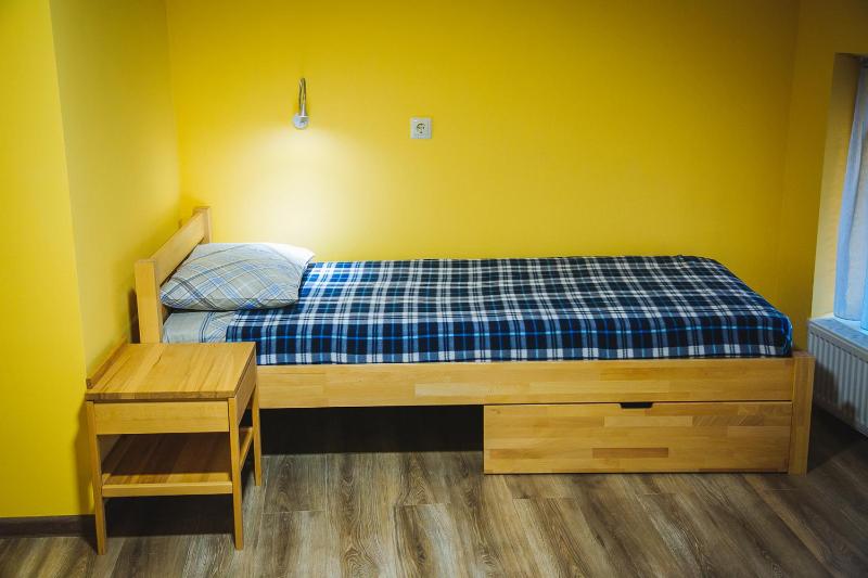 Single Bed in Dormitory Room image 3