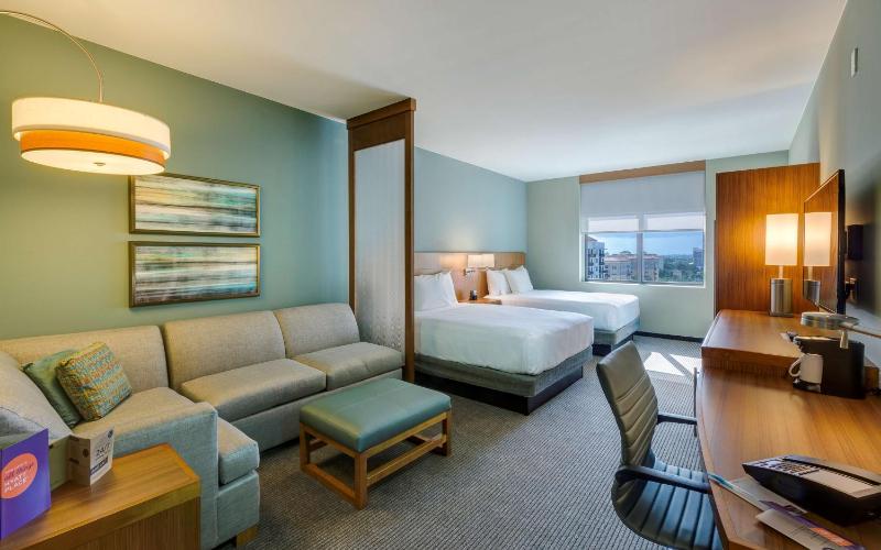 Queen Room with Two Queen Beds and Sofa Bed image 2