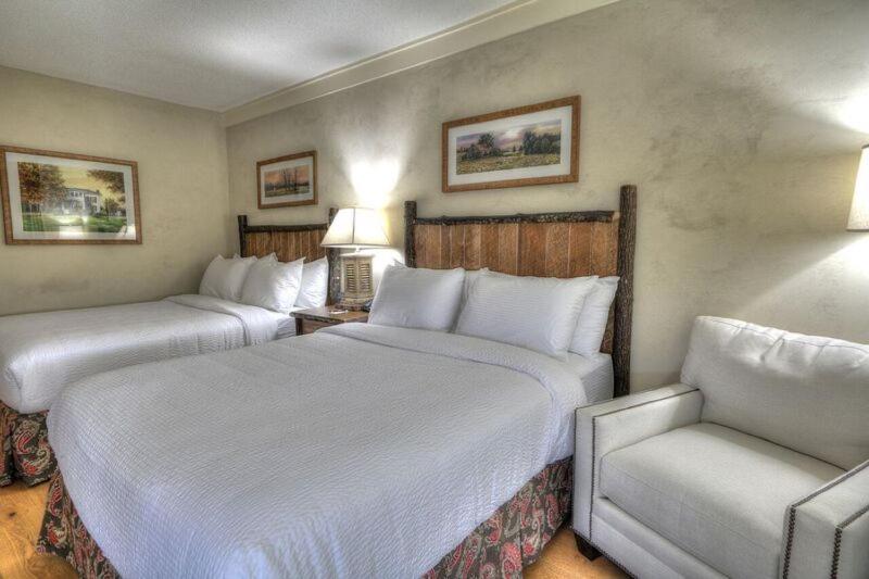 Queen Room with Two Queen Beds and Balcony image 2