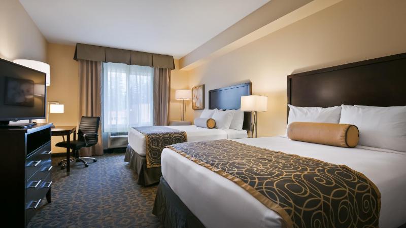 Queen Room with Two Queen Beds and Shower Only - Kitchenette image 2