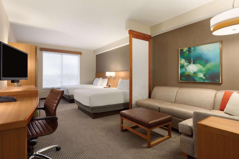 Queen Room with Two Queen Beds and Sofa Bed image 2