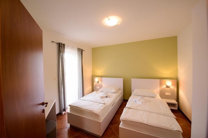 Three-Bedroom Apartment with Balcony Ground Floor image 4