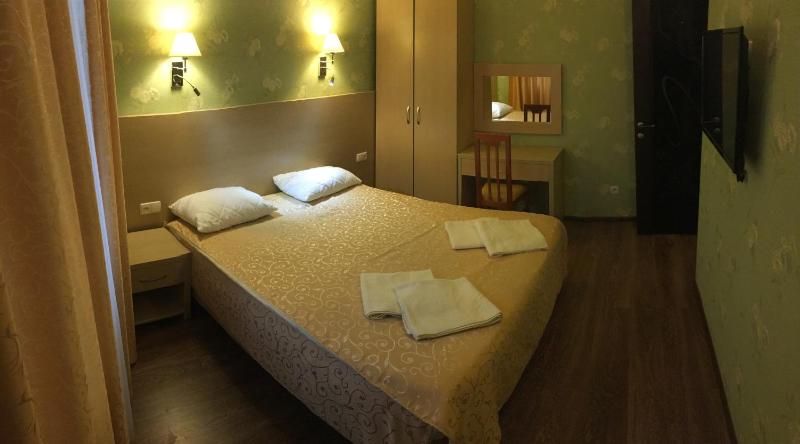 Deluxe Quadruple Room image 1