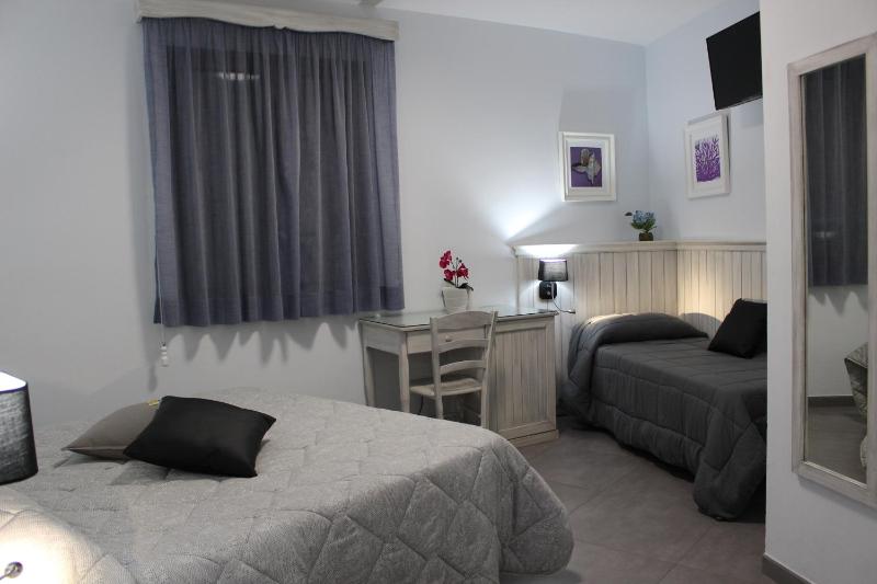 Quadruple Room with Balcony image 3