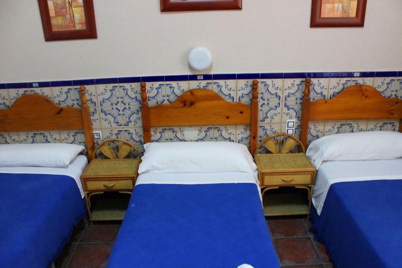 Quadruple Room with Private Bathroom image 1