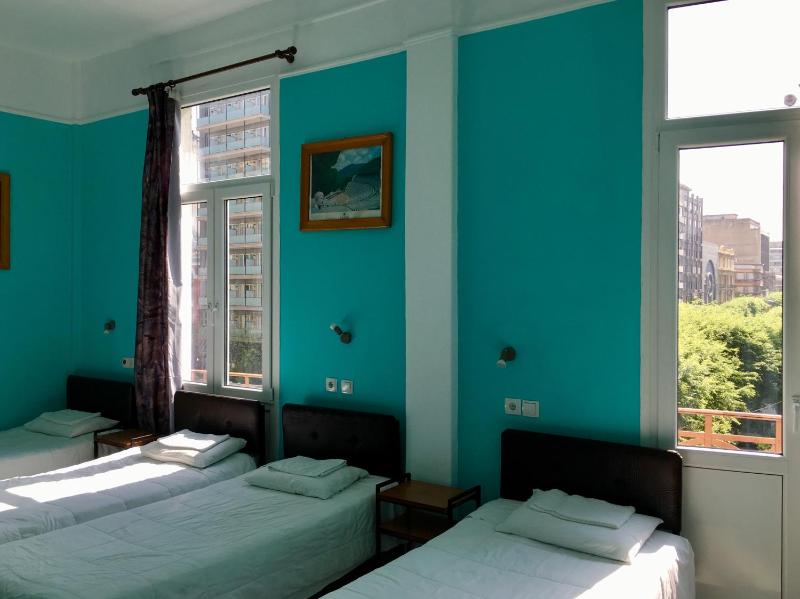 Economy Quadruple Room with Shared Bathroom image 3