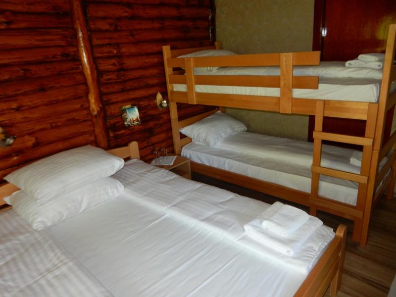 Quadruple Room with Balcony image 3