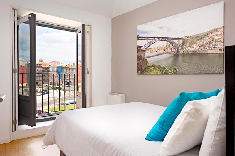 One-Bedroom Apartment with Balcony and City View image 1