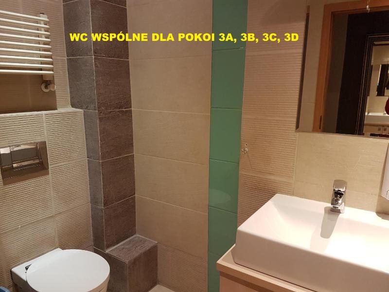 Basic Triple Room with Shared Bathroom image 3