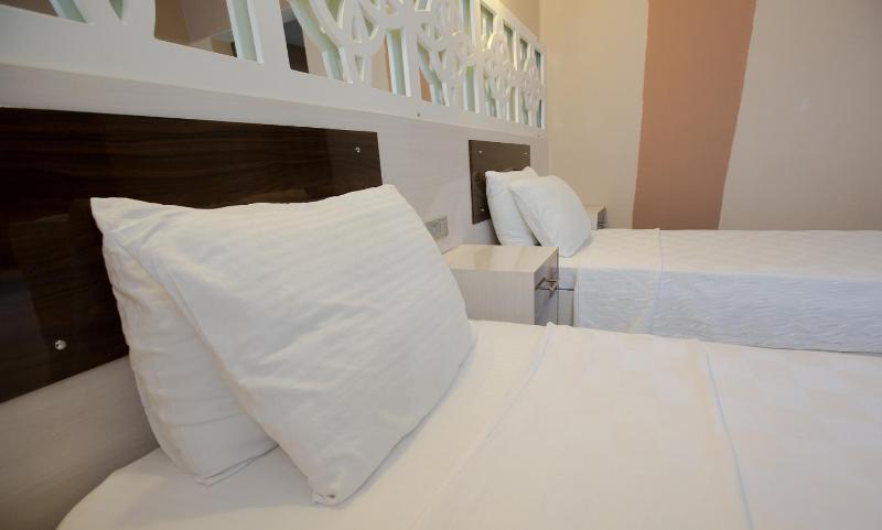 Deluxe Triple Room with Balcony image 1